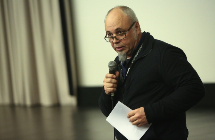 Stefan Rusu introducing the screening "Nothing To Lose: The Melancholy of Resistance" at transmediale 2018 face value